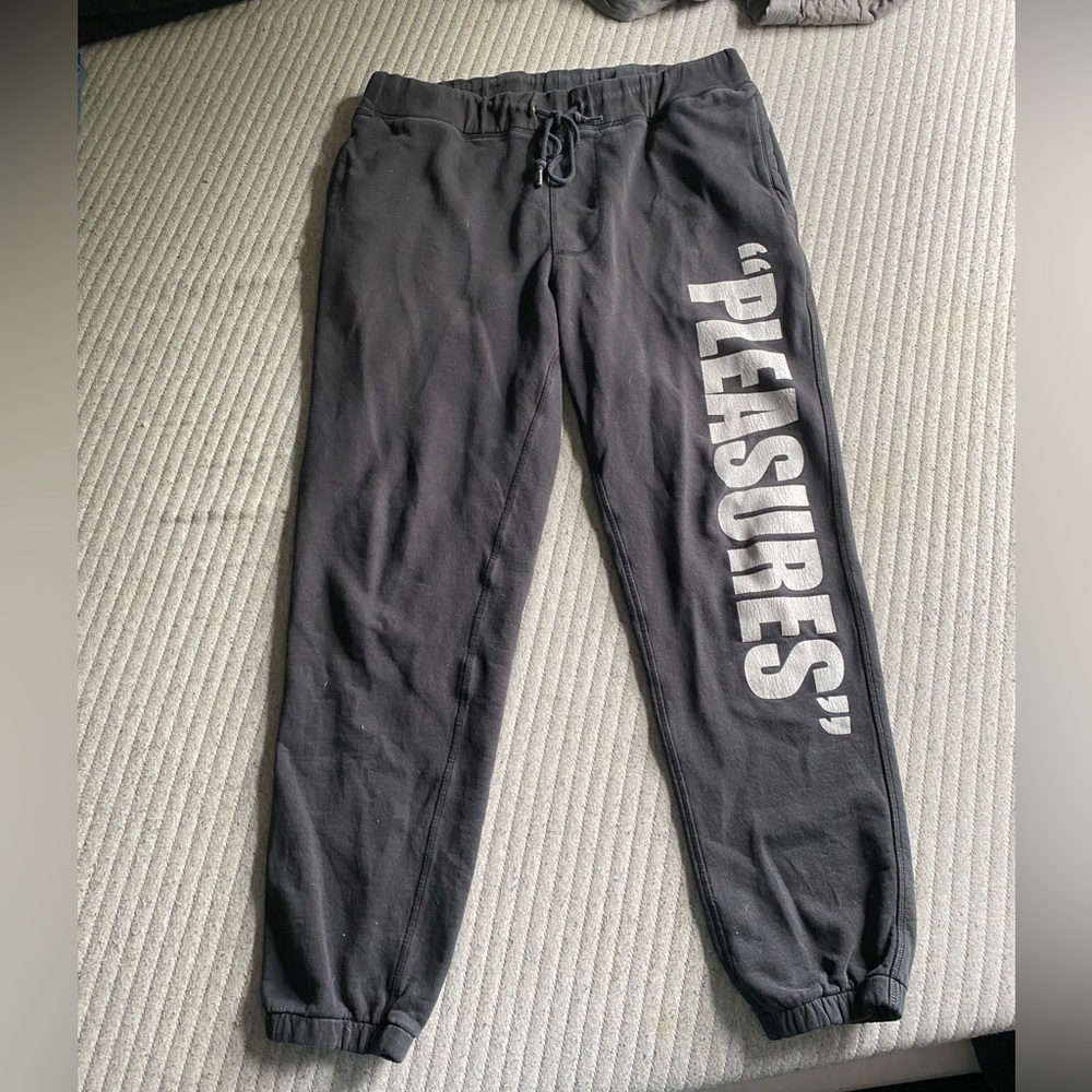 "PLEASURES" black sweatpants